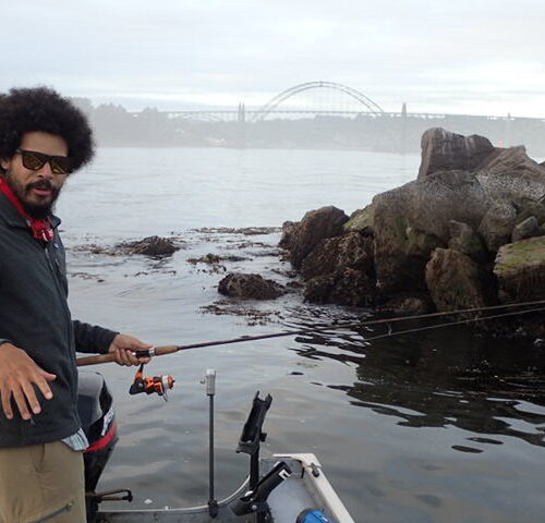 Poet and professor, Geffrey Davis, rockfishing off the Lucky Skunk, Newport, Yaquina Bay, July, 2022. 